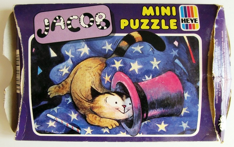 An illustration of a cartoon cat with a magic top hat on a starry blue background.