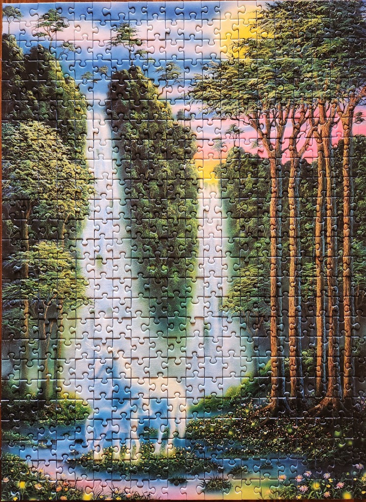 A fantasy illustration of a unicorn standing before a glowing waterfall in a lush forest at sunset.
