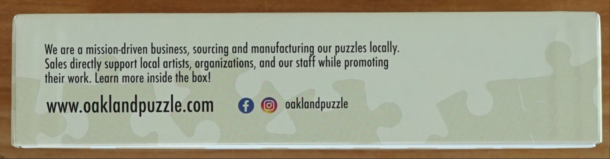 Text on a light green background with faint jigsaw piece silhouettes.