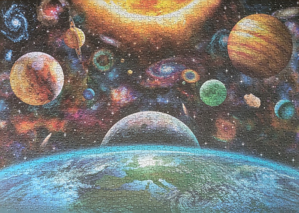 A vibrant cosmic scene featuring planets, a large sun, galaxies, and a view of a planet from space.