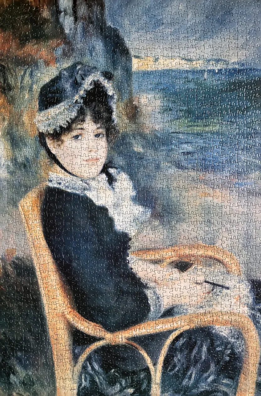 A painting of a young woman in a dark hat and coat sitting in a wicker chair by the sea.