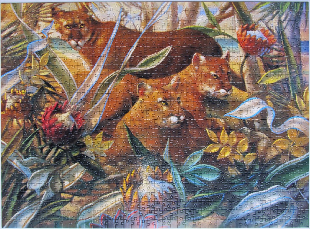 Two cougars resting in a lush, floral tropical landscape.