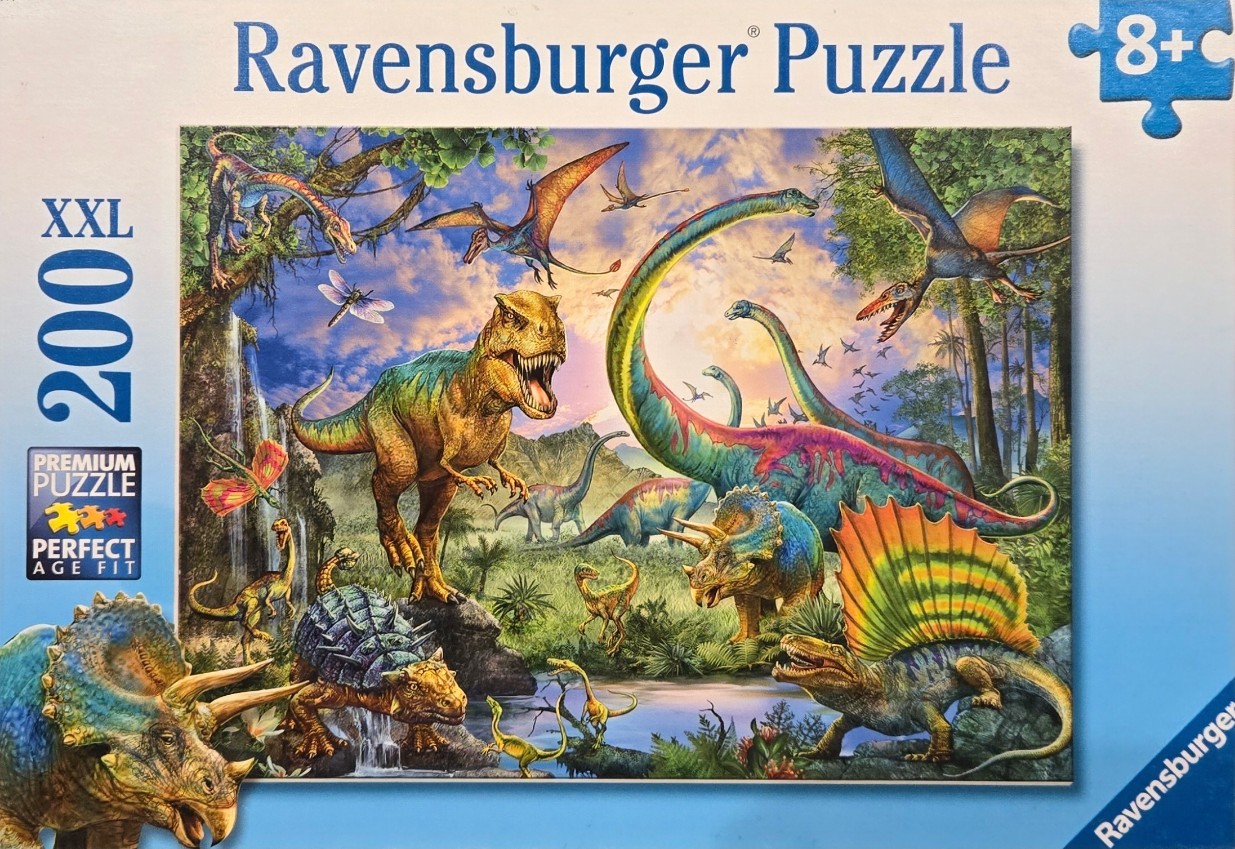 Vibrant prehistoric jungle scene featuring a Tyrannosaurus Rex, a long-necked sauropod, and various other dinosaurs.