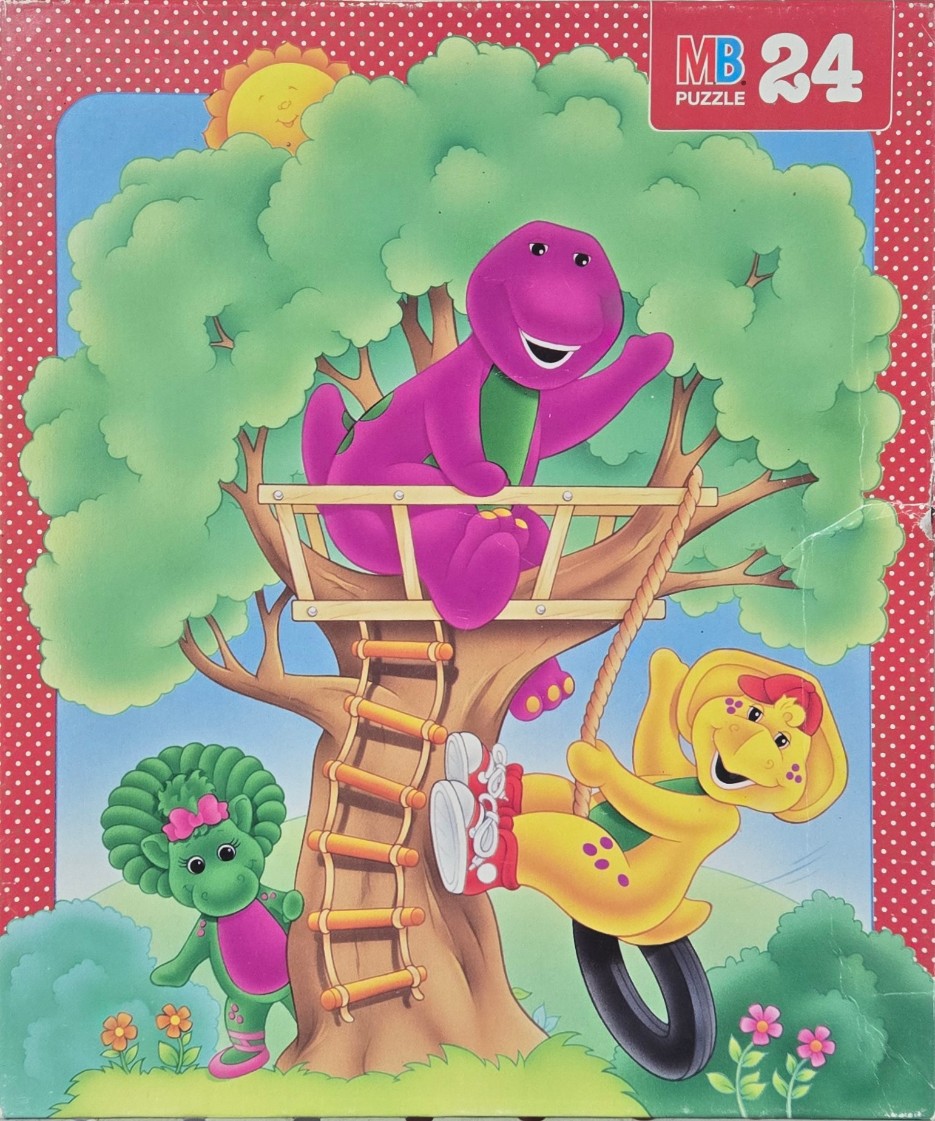 Barney the purple dinosaur, B.J. in yellow, and Baby Bop in green playing in a tree house.