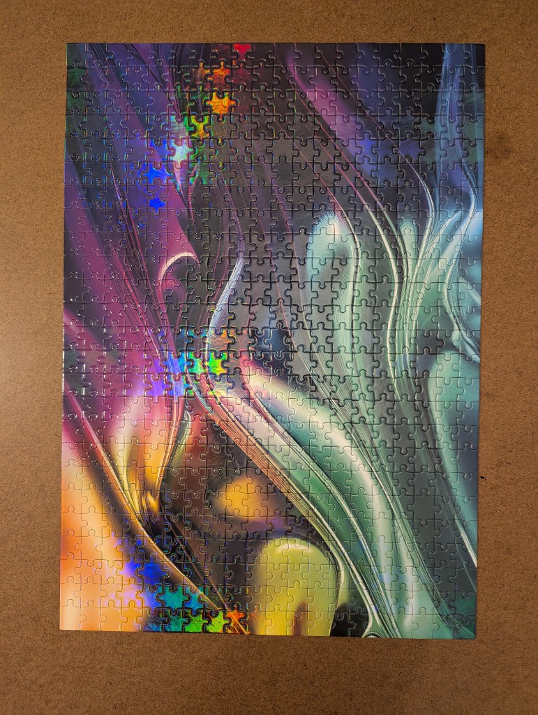 Abstract digital art featuring fluid, flowing shapes in vibrant neon hues of purple, green, and gold against a dark backgroun