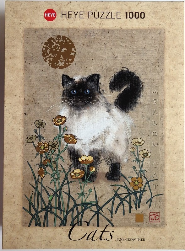 A fluffy Ragdoll-style cat standing amidst buttercup flowers under a textured moon on a parchment-like background.