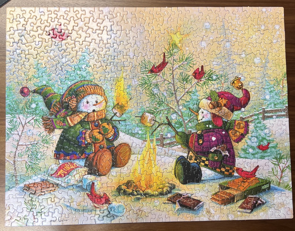 Illustration of two snowmen roasting marshmallows over a campfire in a snowy winter scene.