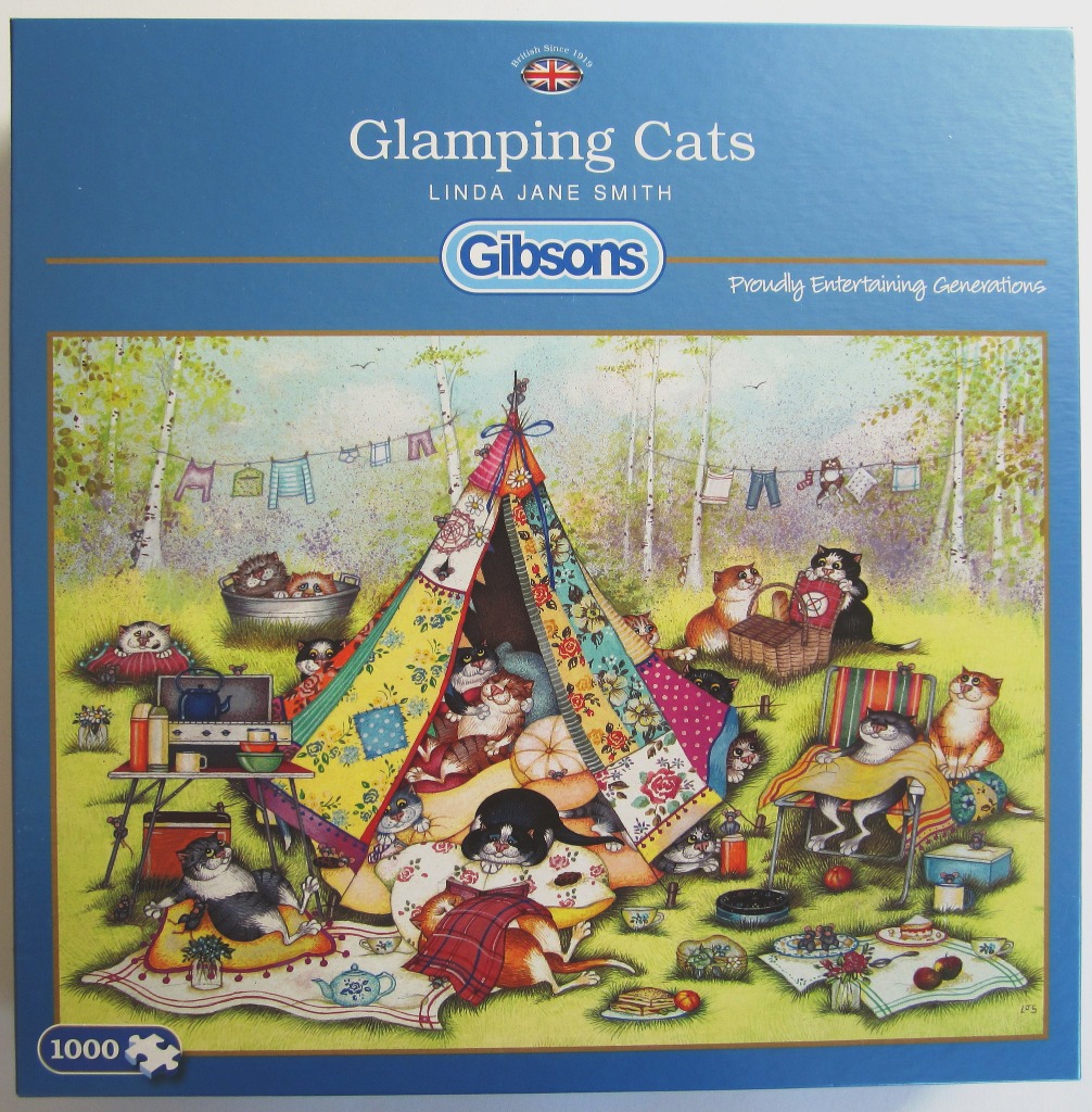 A whimsical illustration of many cats gathered around a colourful patchwork tent in a sunny, wooded clearing.