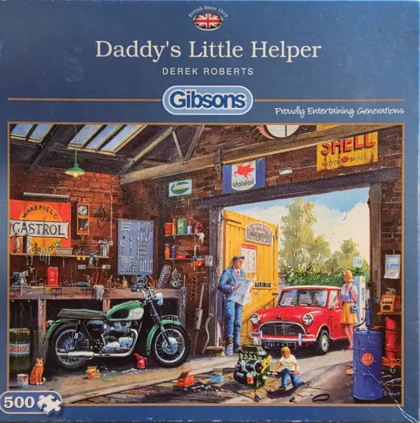 A nostalgic garage scene with a man, child, classic car, and motorcycle.