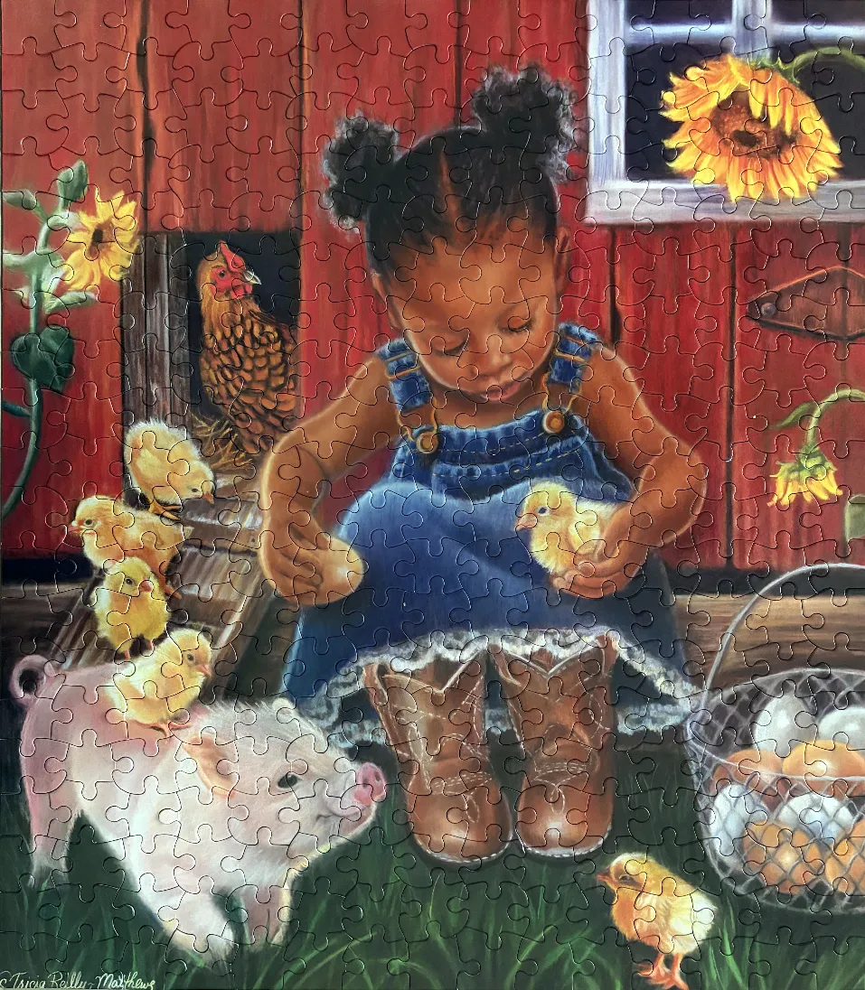 A young girl in denim overalls holding a chick while surrounded by farm animals and sunflowers against a red barn.