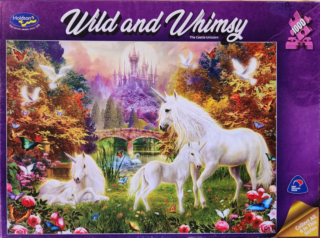 Fantasy illustration of two white unicorns and a foal near a pond and castle.
