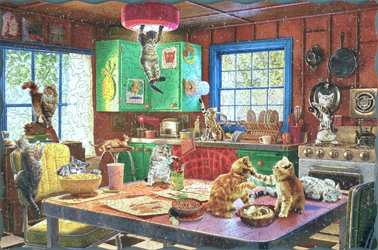 A kitchen filled with mischievous kittens playing on surfaces and tables.