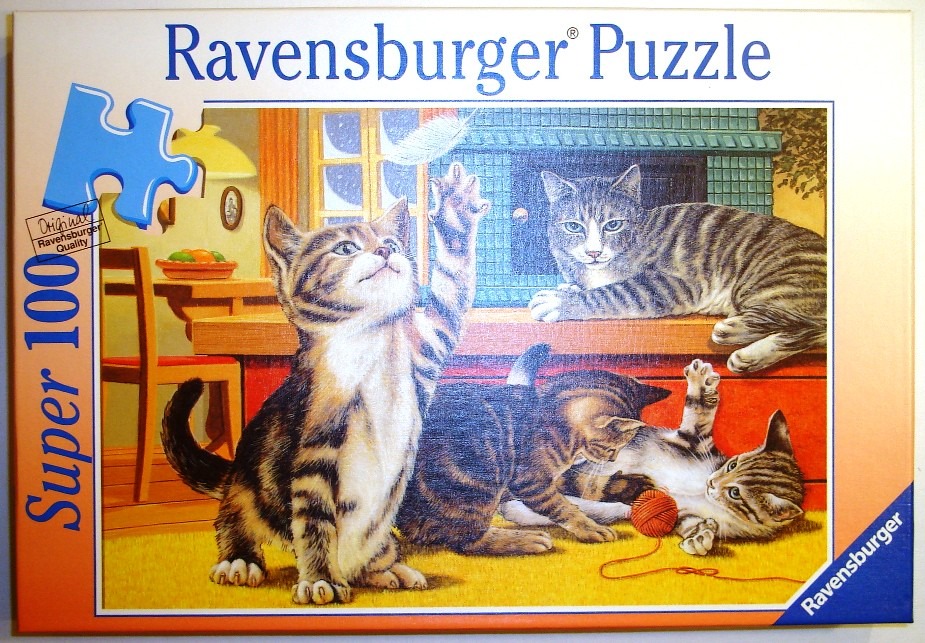 Three tabby kittens playing in a cozy, sunlit room with a ball of yarn and a feather.