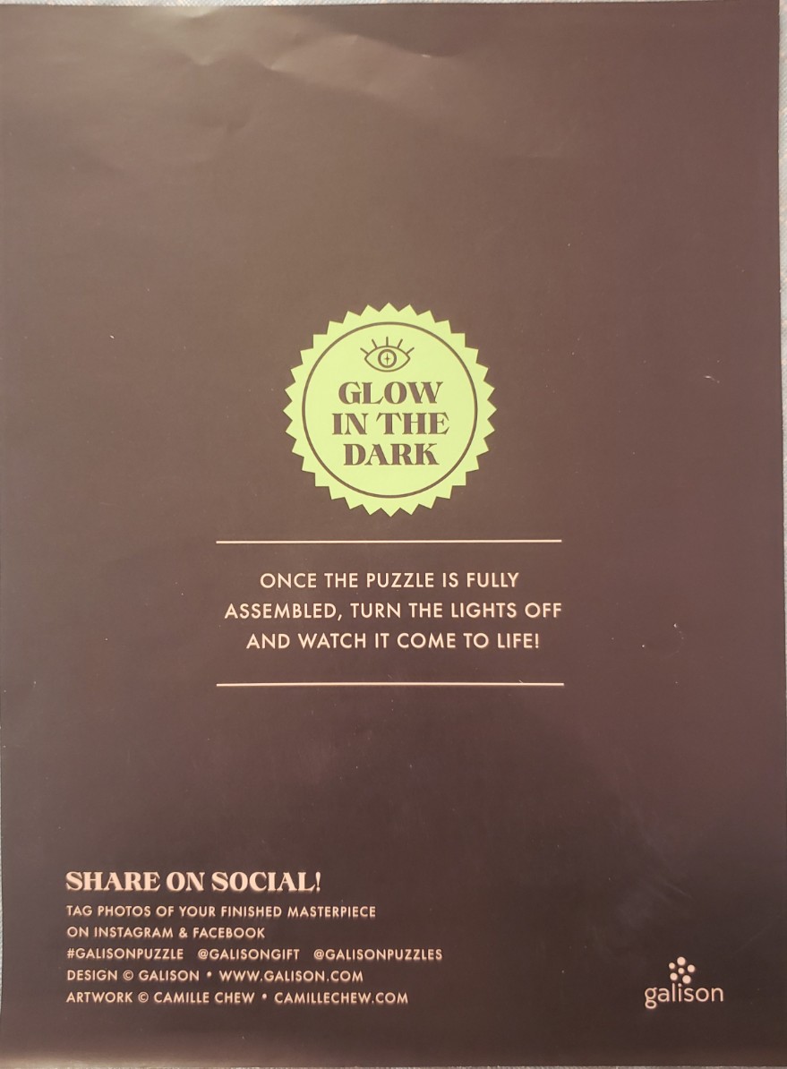 A dark brown rectangular background features a central light green starburst icon with text about a glow-in-the-dark effect.