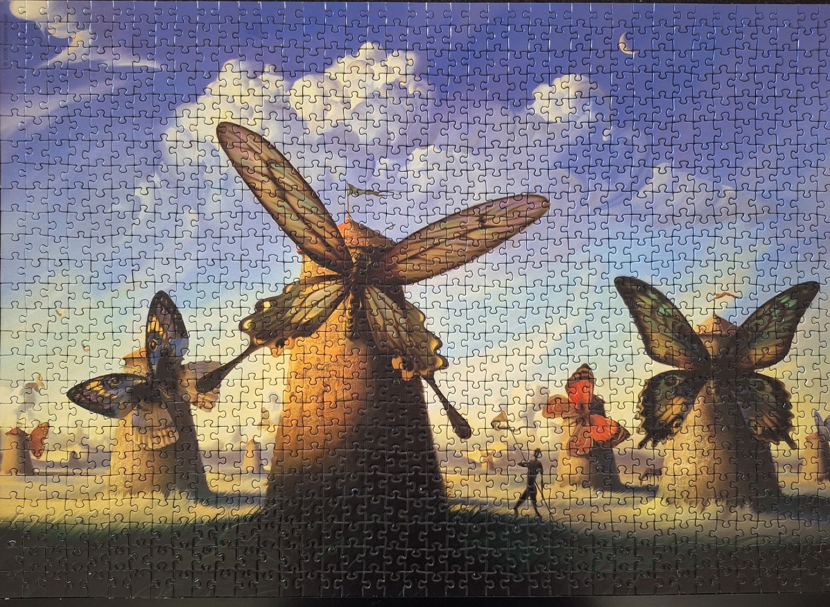 A surreal illustration of windmills with butterfly wings in a sunset landscape.