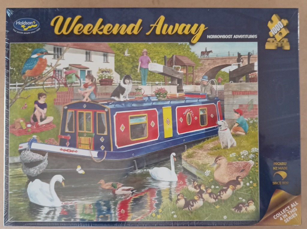 Illustration of a colorful canal narrowboat surrounded by people, pets, and wildlife in a peaceful countryside setting.