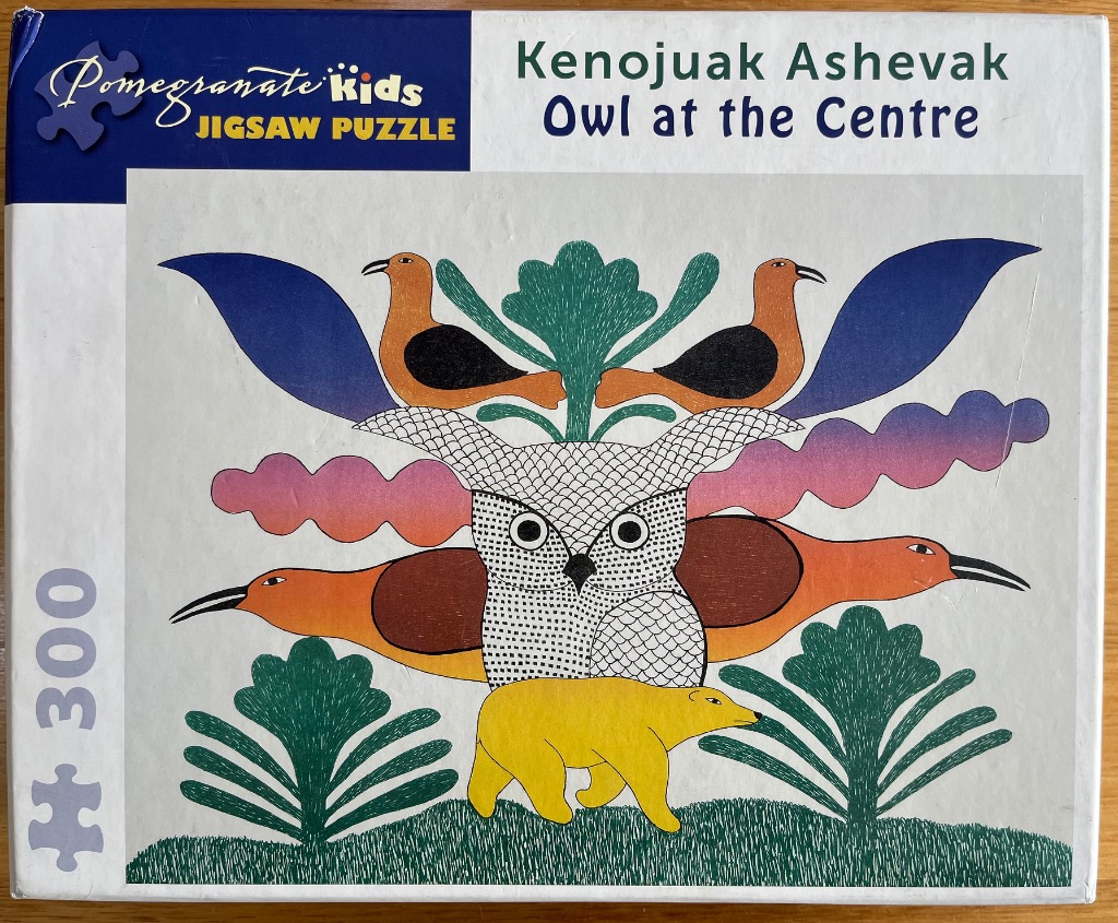 Stylized illustration of an owl, three birds, and a polar bear in a symmetrical Inuit-inspired art style.