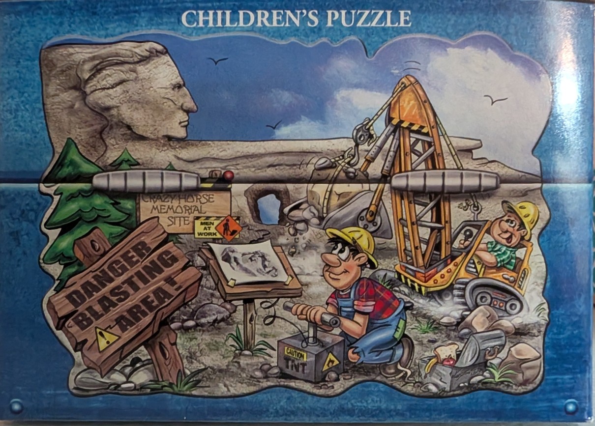 Cartoon illustration of construction workers at the Crazy Horse Memorial, featuring a crane, TNT, and warning signs.