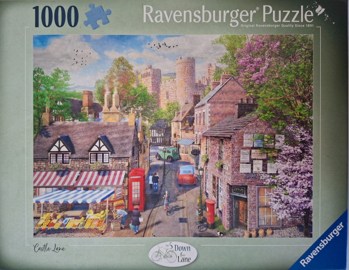 A charming English village scene with a stone castle in the background, a red telephone box, and a produce market.