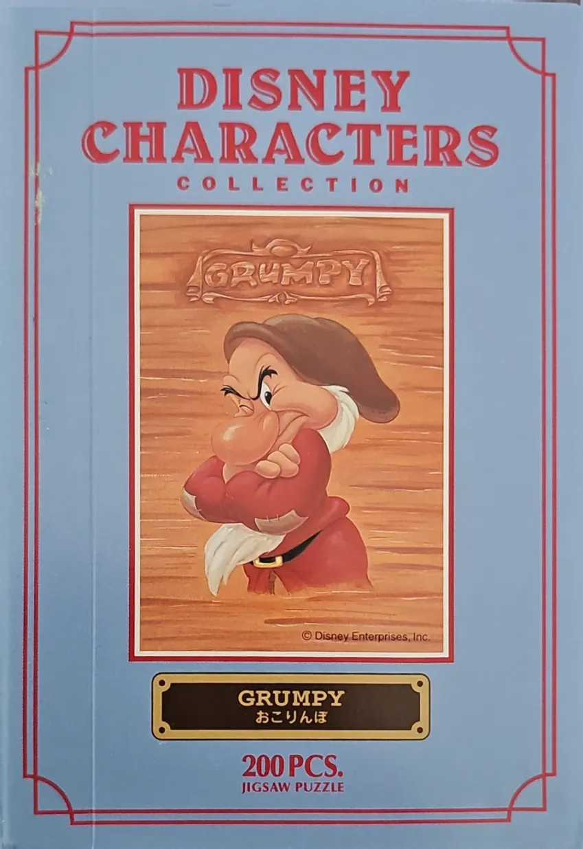 Grumpy from Snow White and the Seven Dwarfs set against a light blue background with decorative borders.