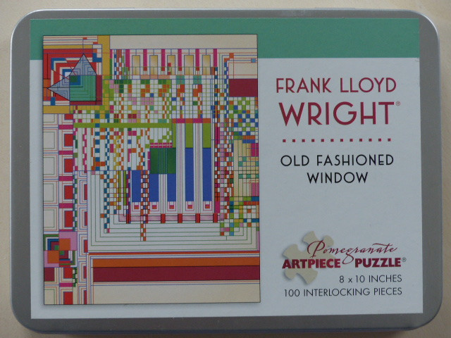 Geometric art based on a Frank Lloyd Wright window design featuring colourful rectangles and lines on a cream background.