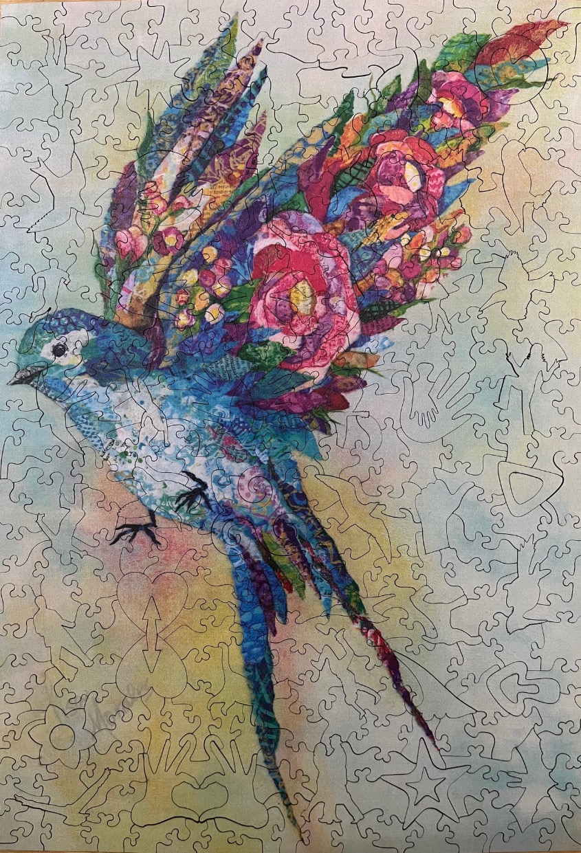 An artistic collage illustration of a swallow bird whose wings are composed of vibrant pink and purple floral patterns.