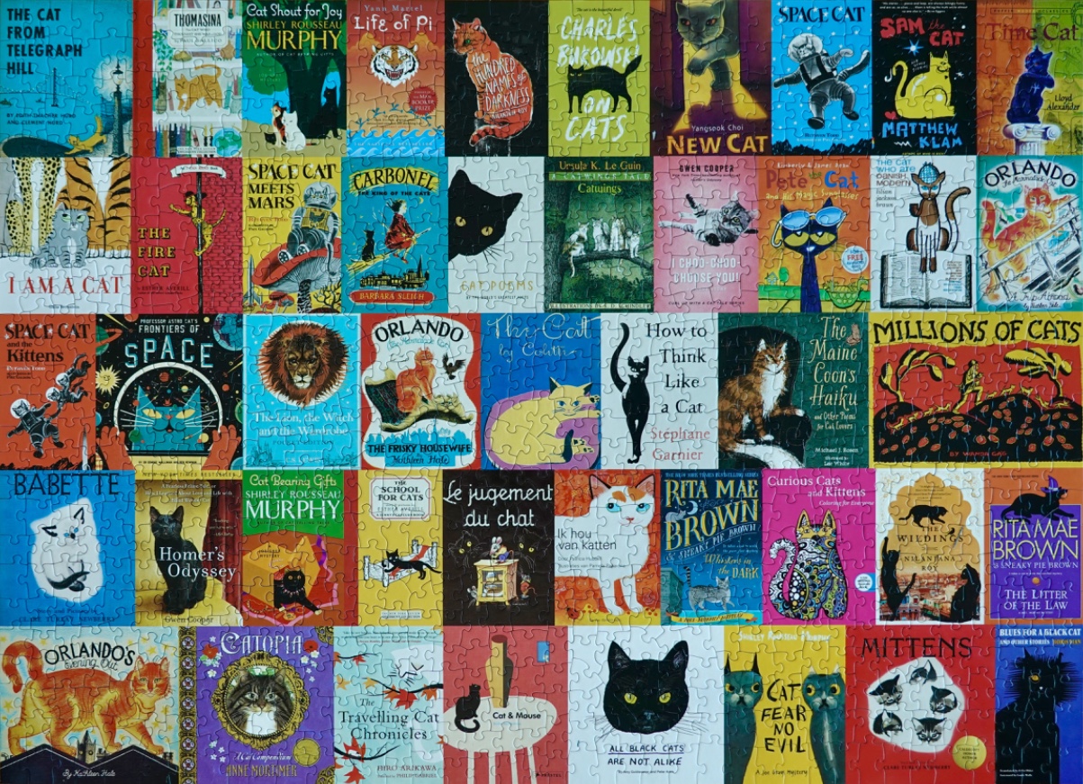 A grid of 40 iconic cat-themed book covers featuring diverse illustrations and styles.