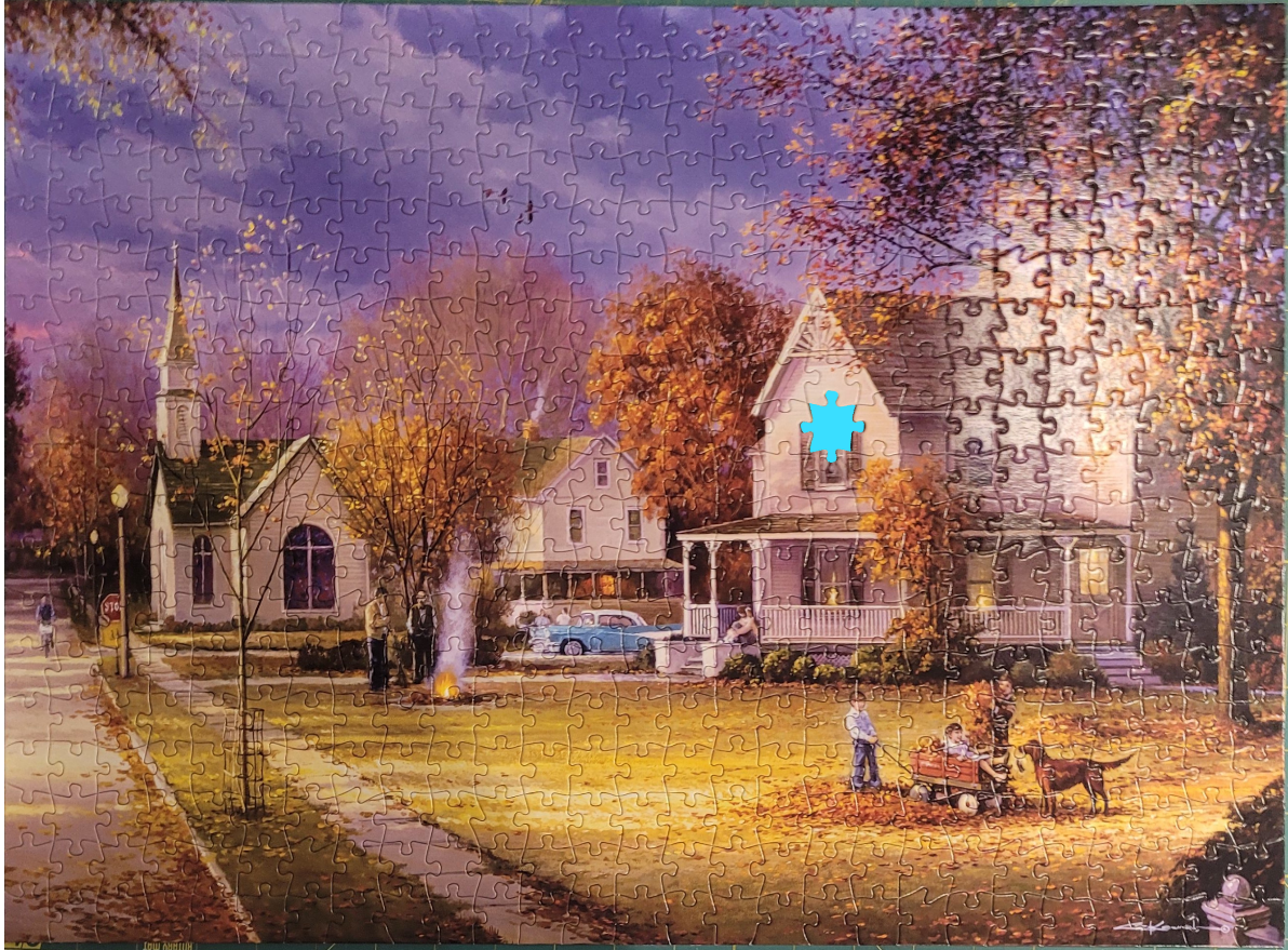 A small town street scene in autumn with a church, houses, and people enjoying the fall weather.