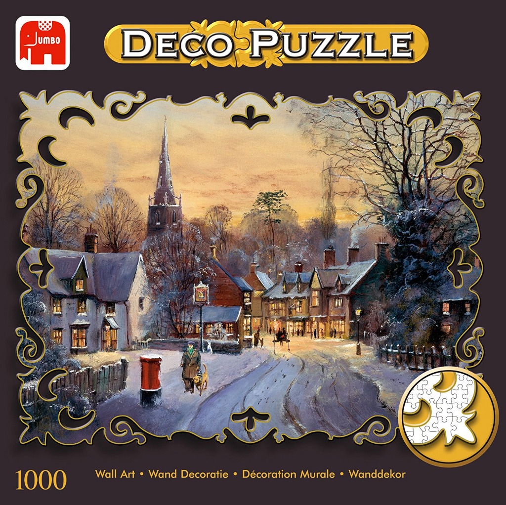 An oil painting of a snowy English village scene at sunset, framed in a decorative gold-edged border.