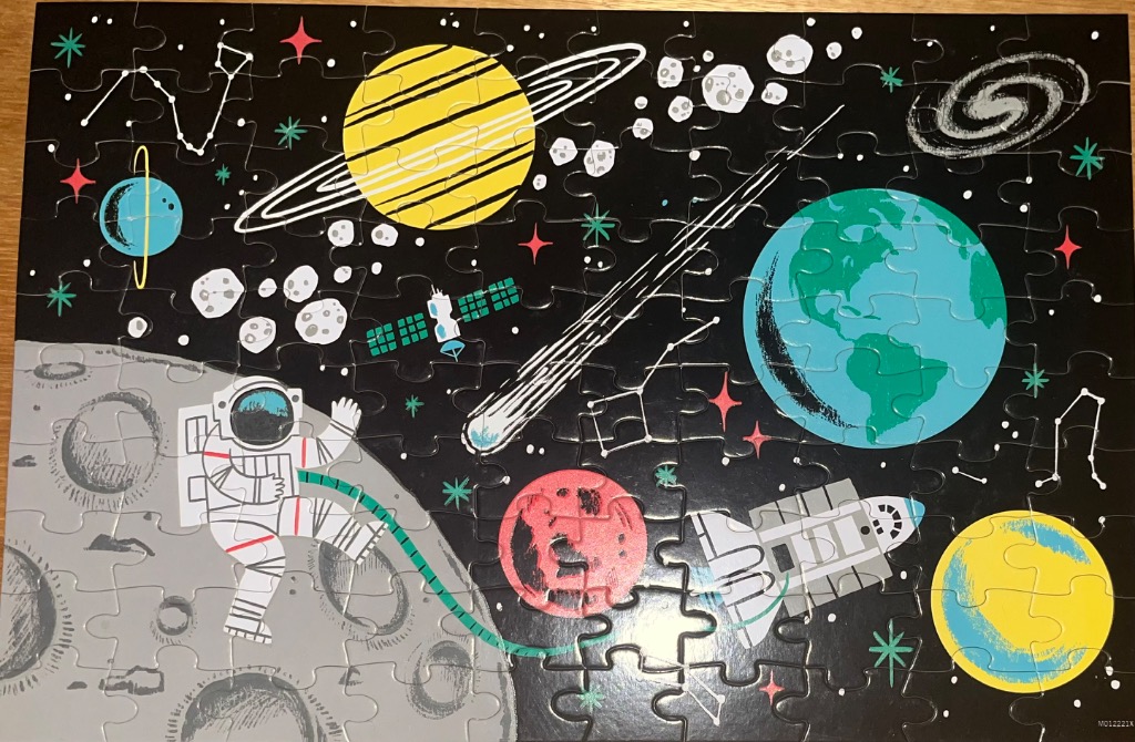 A whimsical illustration of space featuring planets, an astronaut, and a rocket against a black background.