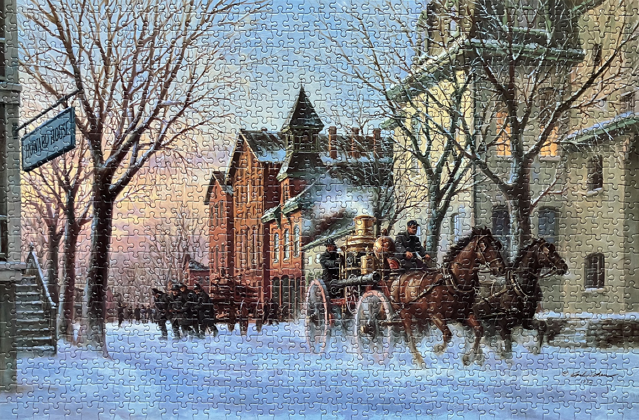 A horse-drawn fire engine traveling down a snowy town street at dusk.