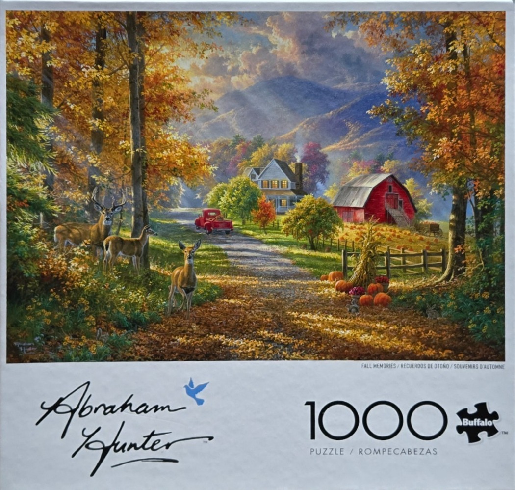 A peaceful autumn landscape with a deer family in the foreground, a red barn, and mountains in the distance.