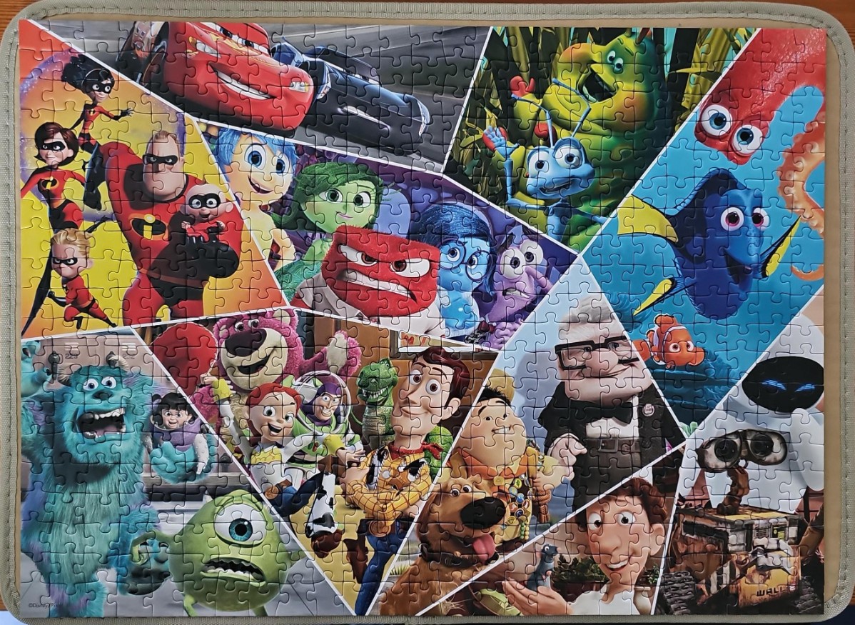 A montage of various Disney and Pixar animated movie characters arranged in a diagonal geometric layout.