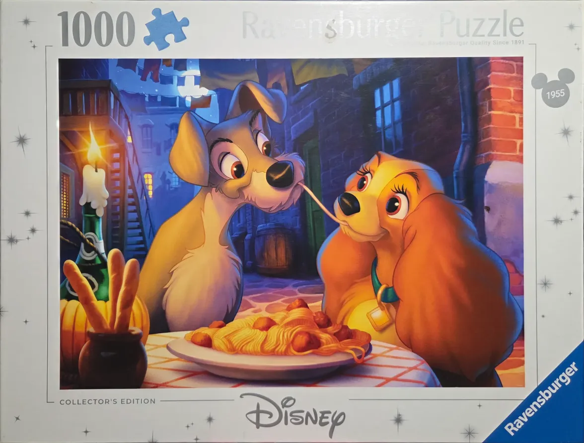Lady and the Tramp eating spaghetti at a table in an alleyway at night.