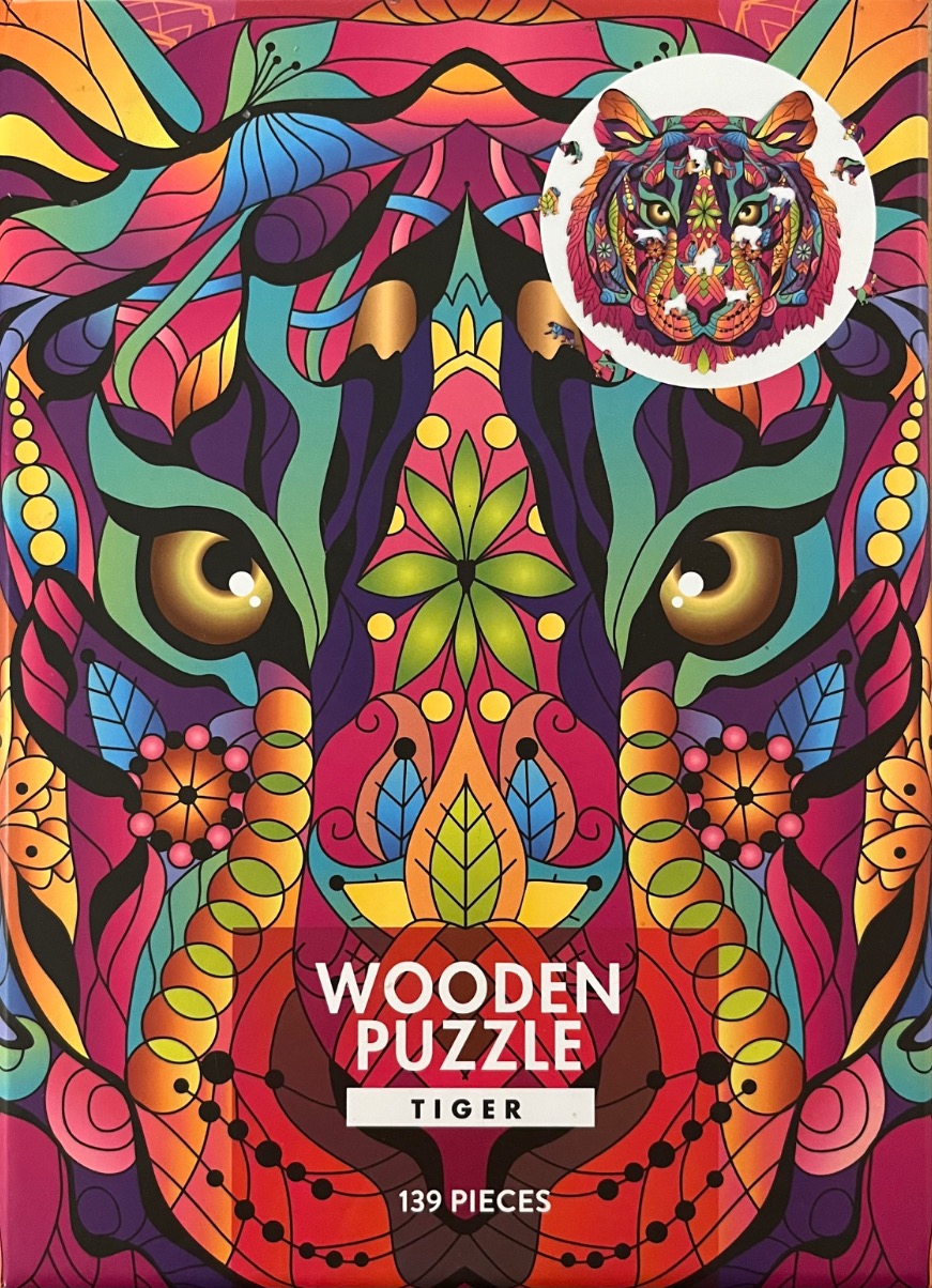 A close-up illustration of a tiger face rendered in a vibrant, kaleidoscopic, stained-glass inspired style.