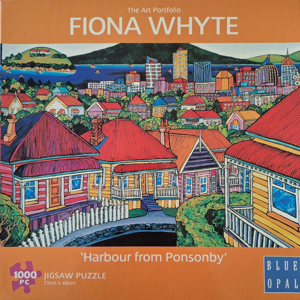 Stylized painting of colorful houses in the foreground with a city skyline and harbour in the background.