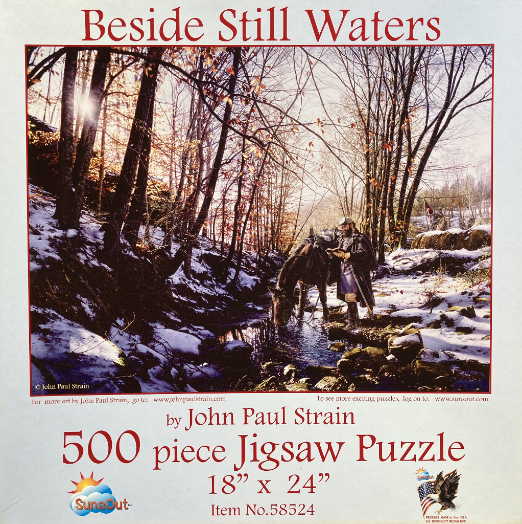 A Civil War era soldier stands beside a stream in a snowy forest, reading a book as his horse drinks.