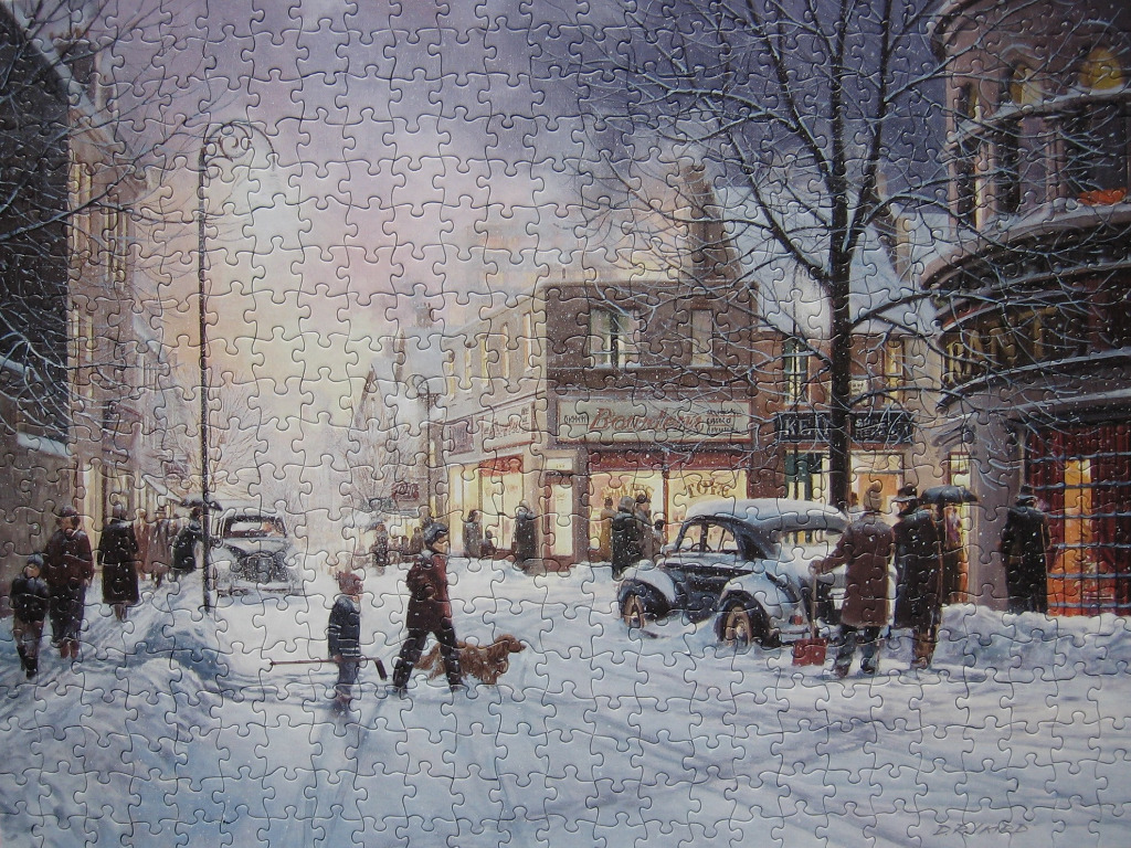 A nostalgic winter street scene with snow-covered roads, vintage cars, and people walking in the evening light.