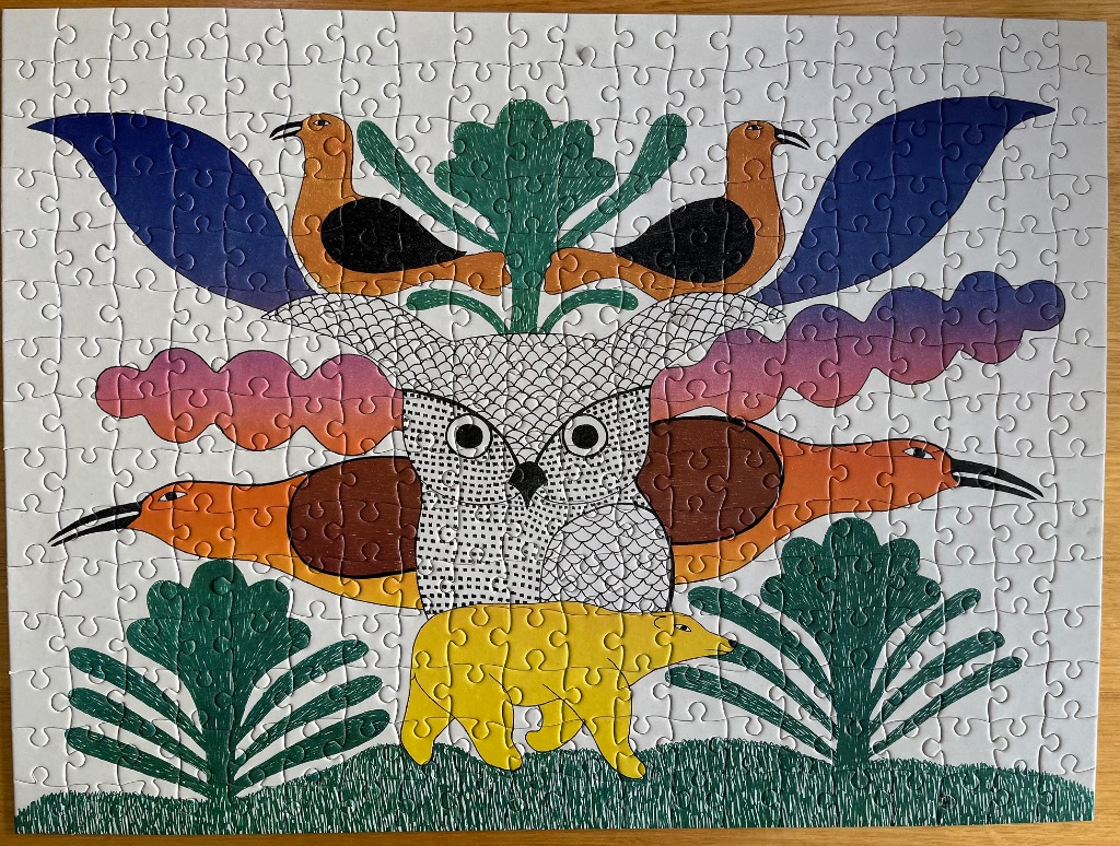 A whimsical illustration of a central owl flanked by birds and a bear against a white background.