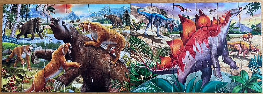 A split-screen illustration showing prehistoric mammals on the left and dinosaurs on the right.