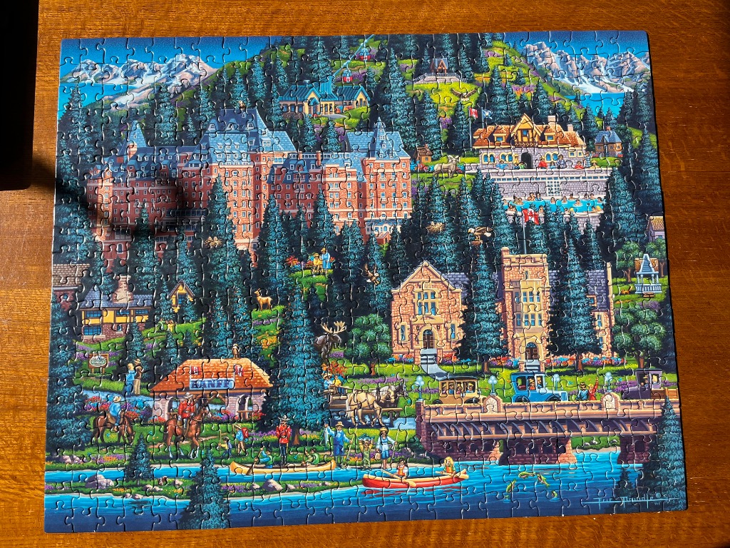 An illustrated, nostalgic mountain resort scene in Banff featuring large hotels, a river, and wildlife.