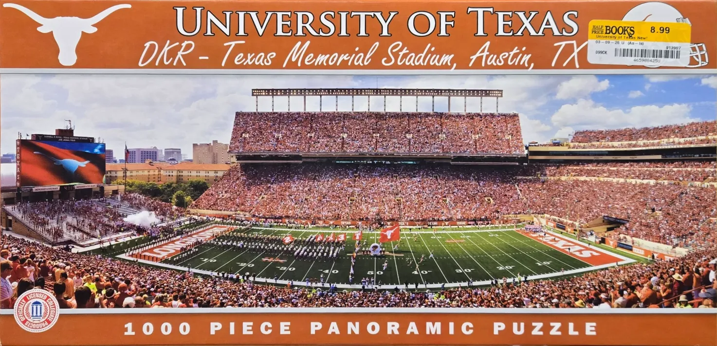 Panoramic view of the University of Texas DKR-Texas Memorial Stadium filled with a crowd during a game.