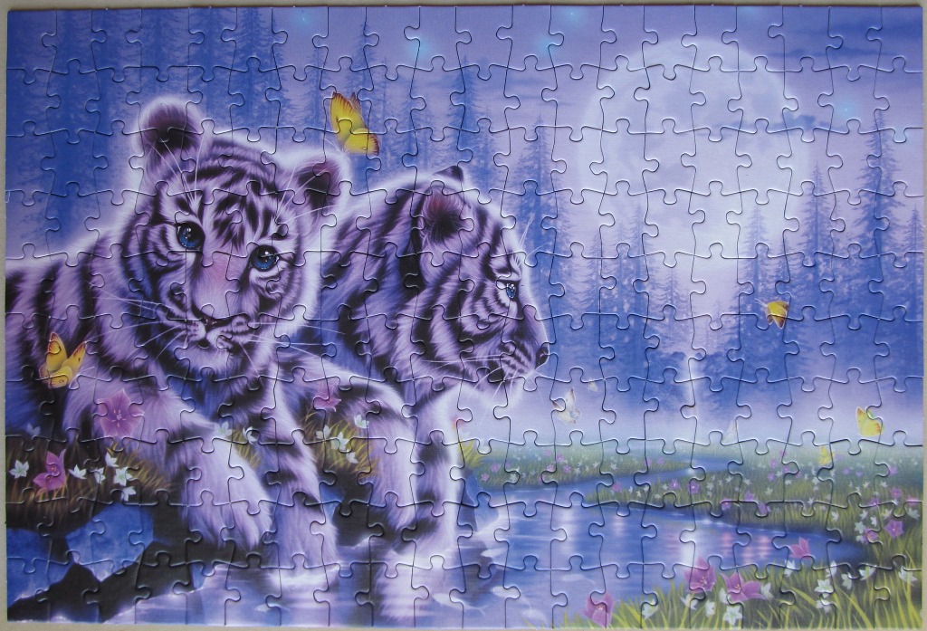 Two white tiger cubs in a mystical moonlit forest with yellow butterflies.