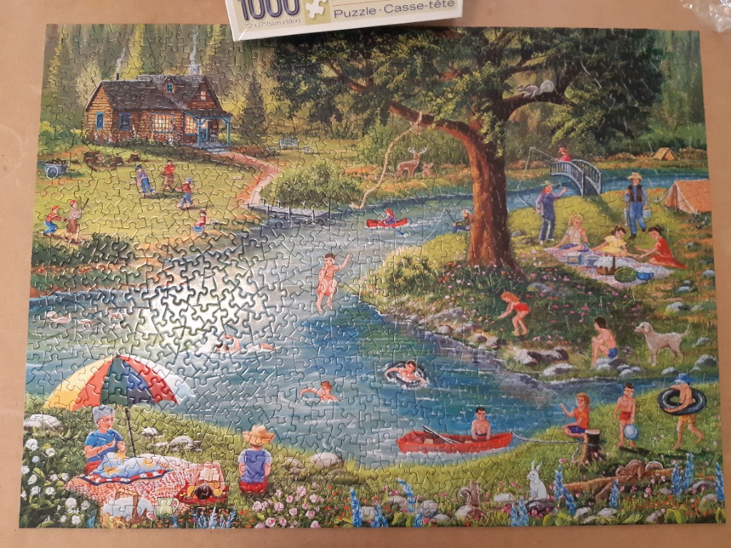 A nostalgic summer scene of a lake, a log cabin, and families enjoying outdoor activities like swimming and picnicking.