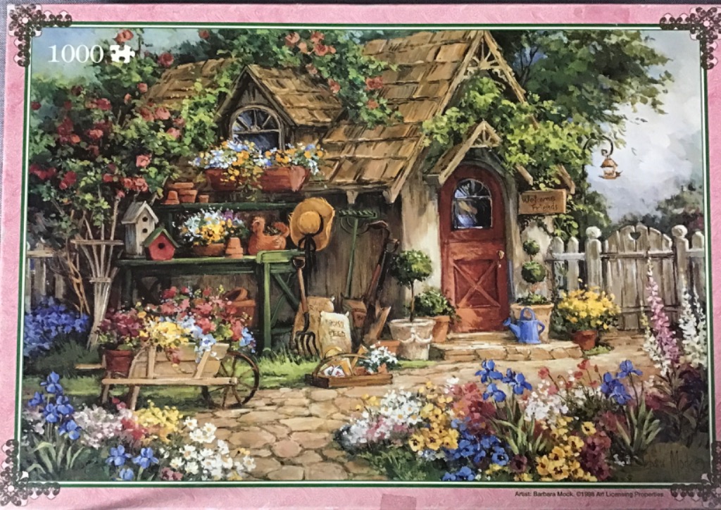 A charming cottage garden scene featuring a rustic potting shed surrounded by vibrant flowers.