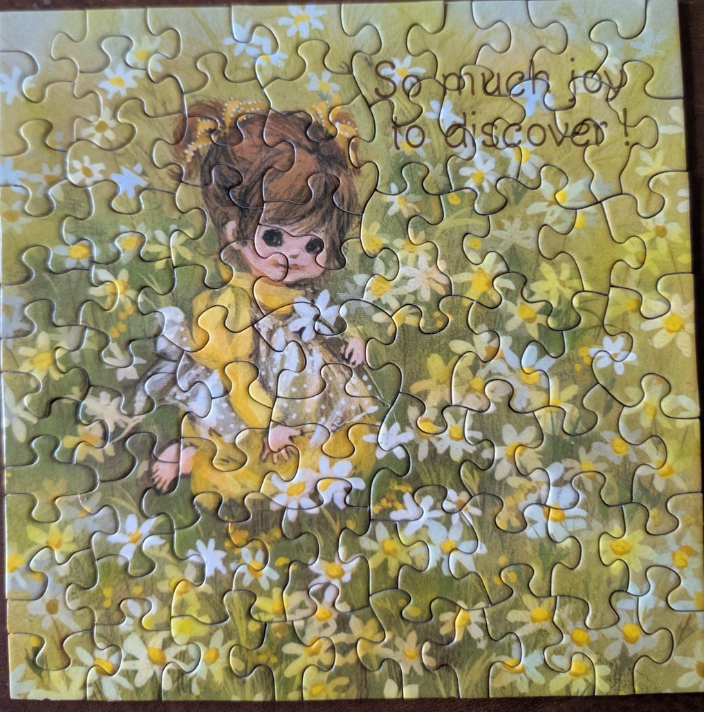 A whimsical illustration of a wide-eyed young girl with brown hair standing in a field of white and yellow daisies.