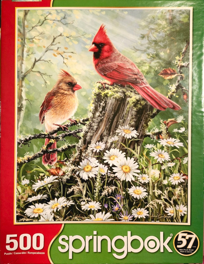 A vibrant illustration of a male and female cardinal perched on a mossy tree stump surrounded by white daisies.