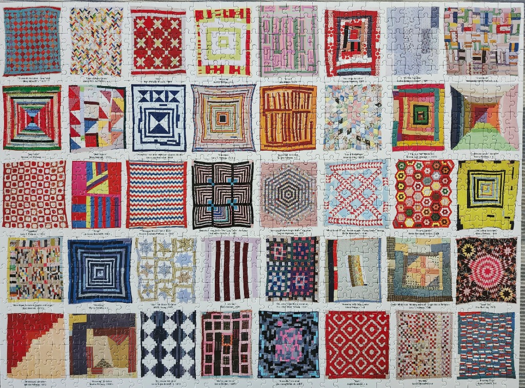 A collage of 35 diverse handmade quilts organized in a grid.