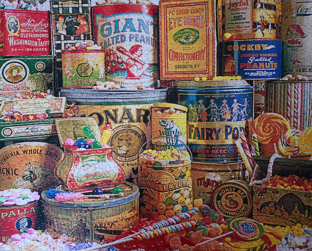 A nostalgic collage of vintage candy tins and jars filled with colorful sweets.