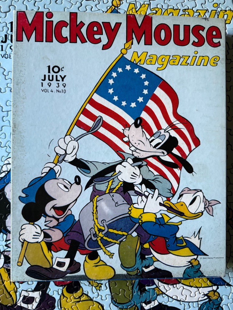 Vintage Mickey Mouse Magazine cover illustration from 1939 featuring Goofy, Mickey, and Donald as a marching band.